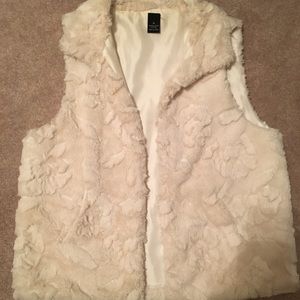 White furry vest